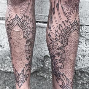 Tattoo collab by Aries Rhysing and Justin Wild #AriesRhysing #JustinWild #lineworktattoos #linework #dotwork #illustrative #ornamental #pattern #mandala #wings #shields #feathers
