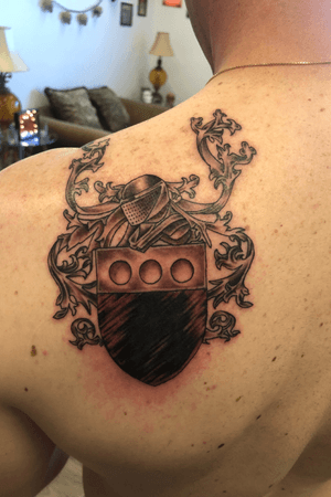 Family crest cover up.