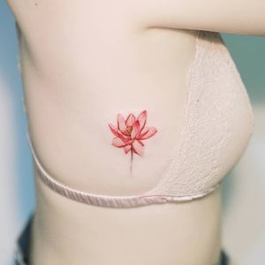 A lotus flower by SION (@tattooistsion)  #flowertattoo #floraltattoo #Korea #KoreanArtist #tattooistsion #colortattoo #flower #flowers #oriental #lotustattoo #minitattoo #smalltattoo 