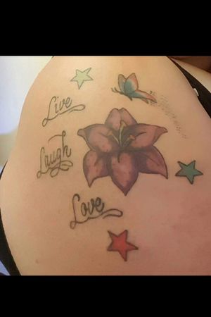 Tattoo number 2 i love the saying live laugh and love and the lilly had other stuff on it which i changed as soo many people had that same design so i changed it to make it my own and here it is xxx