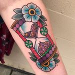 Tattoo by Brie Brutal #BrieBrutal #hourglasstattoos #hourglass #time #glass #color #newschool #traditional #mashup #flowers #floral #leaves #nature #cupcake #sparkles #sprinkles #candy #peppermint