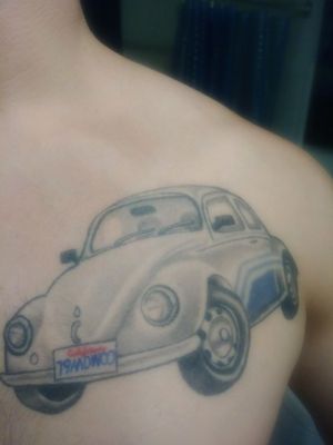 My first tattoo an old 72 beetle (my dad's first car) in memory of my father. On the California plate (which is where my father was born) it has the year he was born, his initials, and then the year he passed (79MDW00)