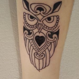 My very first tattoo. It is an owl that was based on another tattoo. I like that it also resembles a mandala.