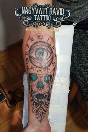 Skull tattoo with clock 