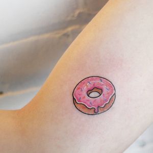 Tattoo by Jessica Channer #JessicaChanner #donuttattoo #donut #doughnut #foodtattoo #food #sweets #comfortfood #cute #funny #newschool #dessert #sprinkles #small #tiny #cute #minimal