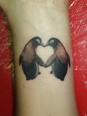 Penguins tattoo done today. Her first tattoo