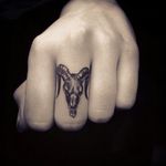 Middle finger satan skull tattoo 