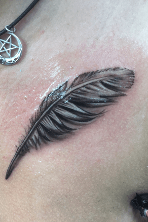 Realistic feather memorial Tattoo 