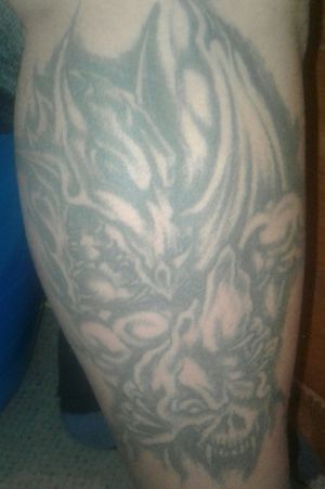 My partners calf Tattoo #Dragon/skullmountain#Artistchrisraimona#learntinjail