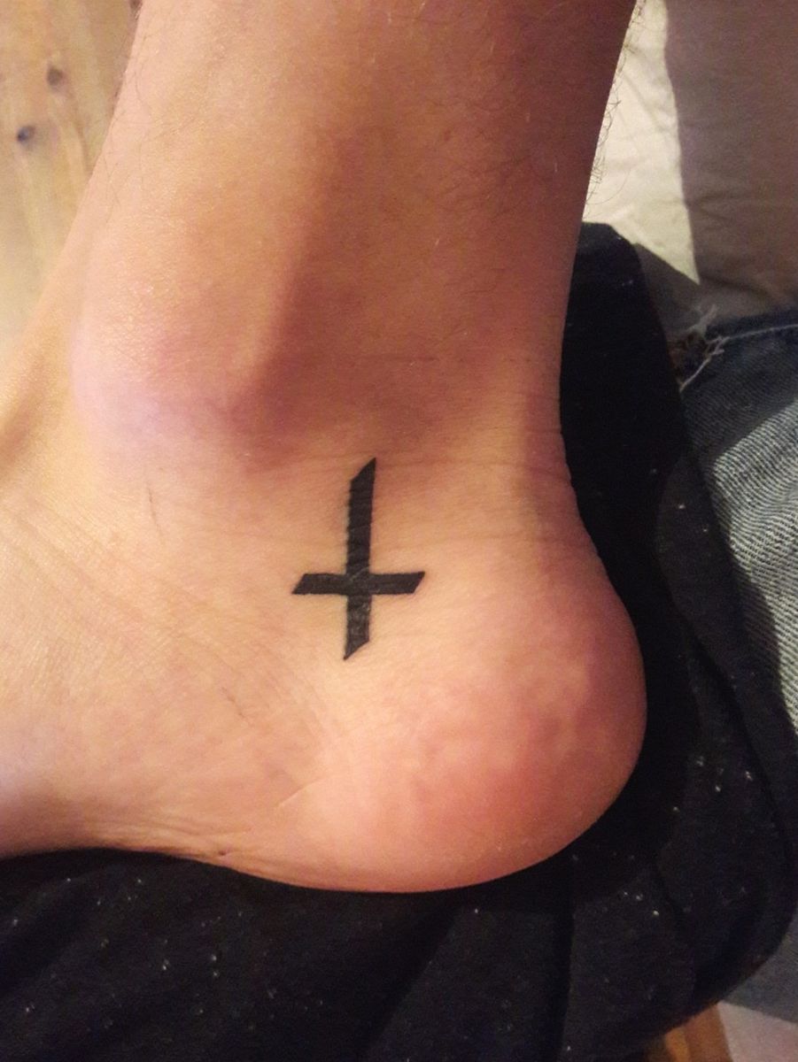 Tattoo uploaded by Val • Upsidedown cross tatooed in Irkutsk, at Joker