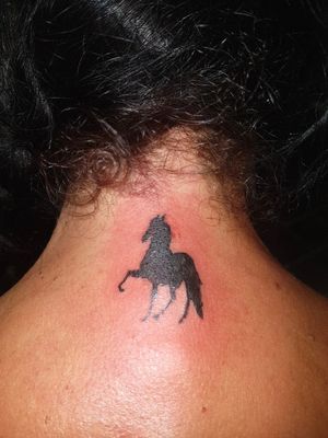 Small horse tattoo done today in remembrance of a horse she recently lost 