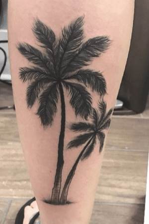 Palm trees on calf. Done by Brynn. 