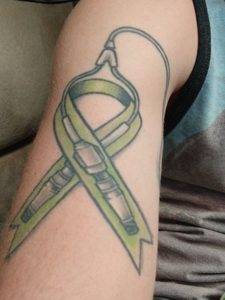 Tattoo uploaded by Quintin Brundege • This was my very first tattoo also  from Nate Luna!! With those who are familiar, it's obviously a cancer  ribbon. But for those who aren't, let