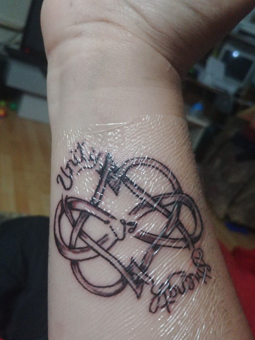 strength infinity tattoo