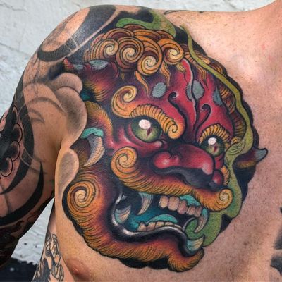 Tattoo by Corey Norris #CoreyNorris #fooddogtattoo #shishi #foodog #lion #guardian #folklore #protector #color #newschool