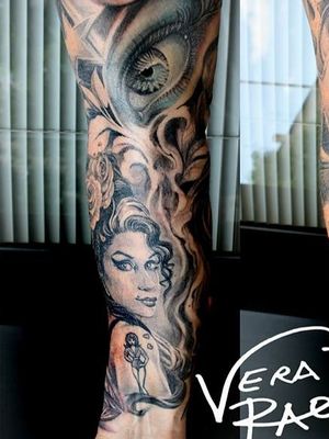 arm  and portraits tattoo