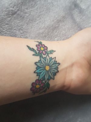 Flowers on the wrist.