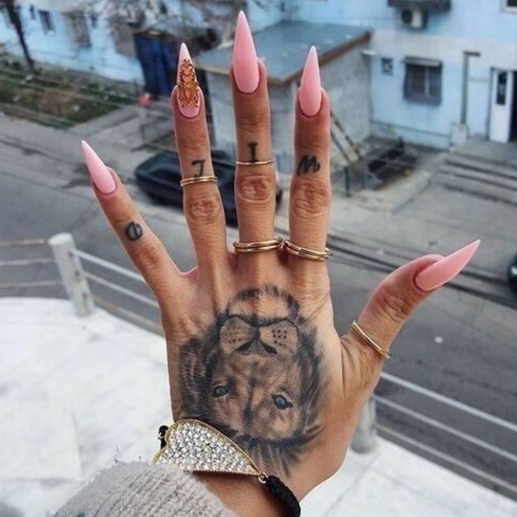 Pin by itslyssaleigh on tattoos and piercings  Tattoos for women Hand  tattoos Finger tattoos