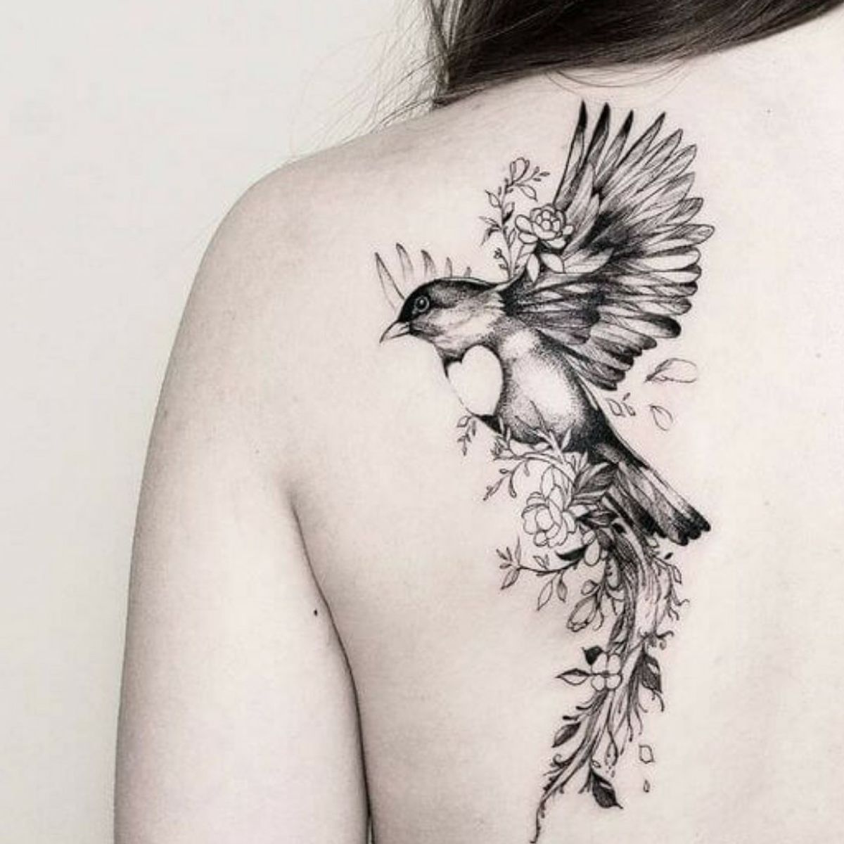 Татуировки женские птицы