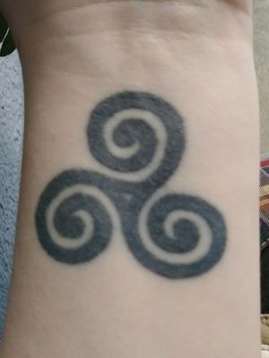Celtic Triple Spiral, got in February 2015. It's on my left wrist.