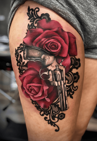 Finished this one up today :) #tattoo #tattoodesign #tattooideas #gun #guntattoo #rose #redroses #redrosetattoo #rosetattoo #lace #lacetattoo #gunsandroses #thightattoo #red #pretty #prettytattoo #girly #girlytattoo #girlythings #firsttattoo #ink #girlswithtattoos #girlswithink #tattoooftheday 