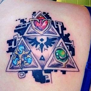 Zelda tribute done by sinister inc in nc. Not the cleanest lines but the gems look beautiful