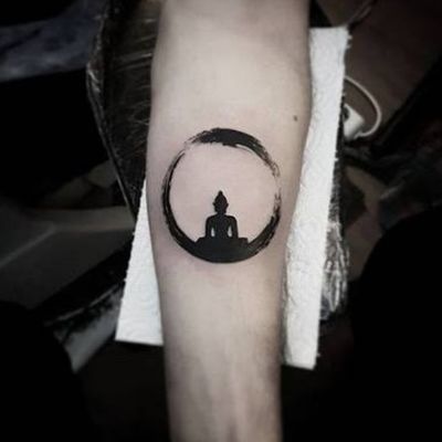 buddhist karma symbol tattoo