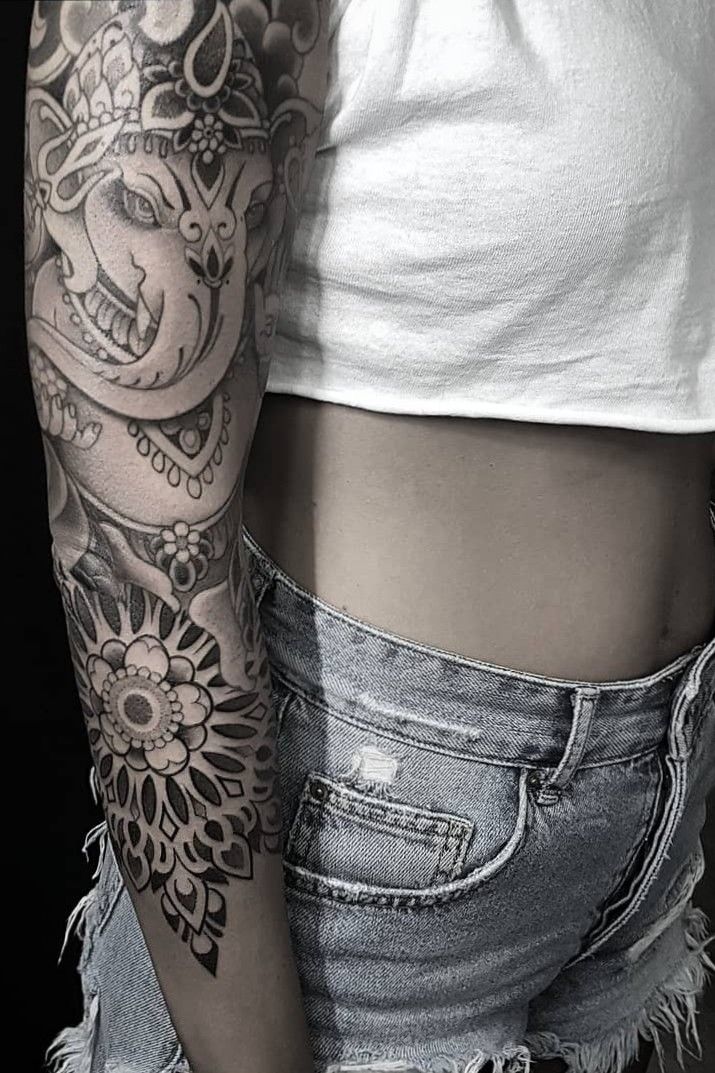 Ganesh and Lotus Half Sleeve Tattoo by Ian Robert McKown TattooNOW