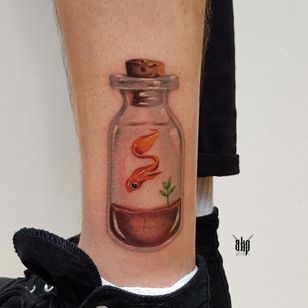 Fish tattoo by Aivis Kleinhofs-Prusis #fish #goldfish #bottle #plant #glass #nature