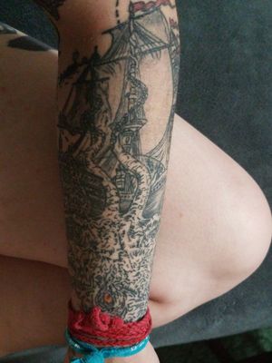 Bottom half of my nautical themed sleeve, a kraken with barely any color (I'm not a very colorful person with it comes to my tatts apparently) attacking a ship