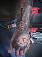 Hands and pocket watch 
