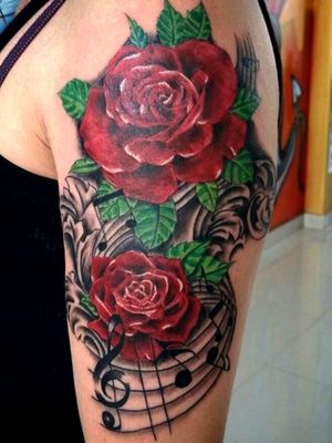 Done two years ago 😘 By Alessandra Gaibotti X info ac_redhouse@yahoo.it Whatsapp 3477804765 #tattoo #livornotattoo #ink #love #tattoo #flowertattoo #rosestattoo #realistic #realistictattoo #liketattoo #musictattoo #armstattoo 