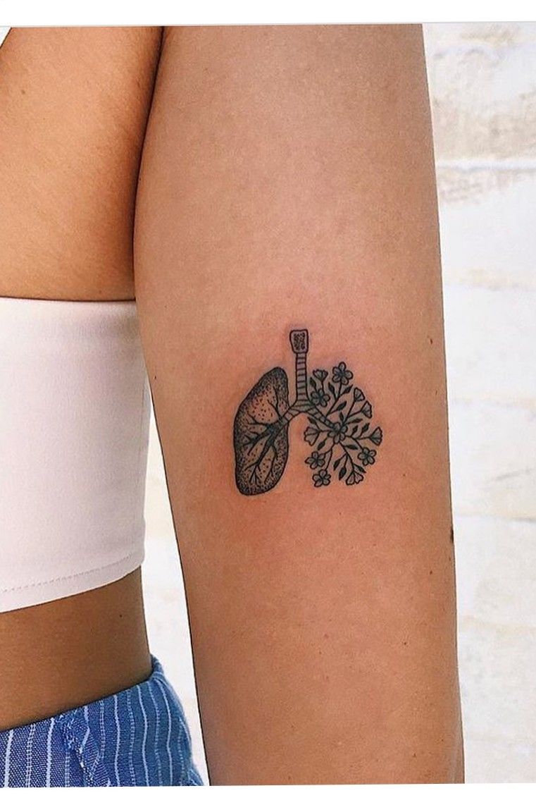 Take things lightly and make impressive Just breathe lettering tattoo