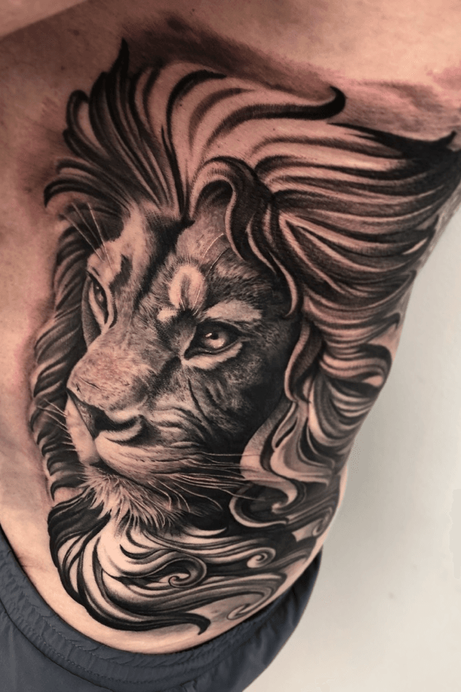Healed black and grey realistic lion themed ribs piece from Cris Cover up  realism realistic lion  Natural tattoo removal Free tattoo designs  Tattoo removal