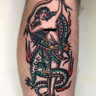 Tattoo by Younes Tattoos #YounesTattoos #traditional #traditional tattoo #color #oldschool #AmericanTraditional #lady #pinup #bowandarrow #dragon #beast #mythicalcreature #fire