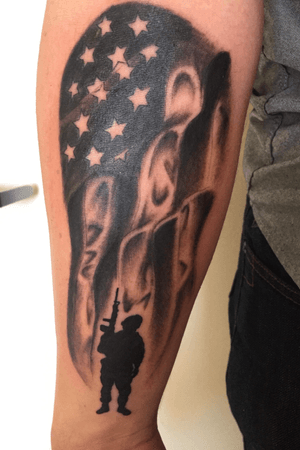 The soldier is who I am and the flag is my love for country.       James did a great job. Right forearm.