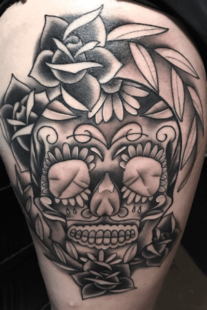 Sugar skull with some traditional rose