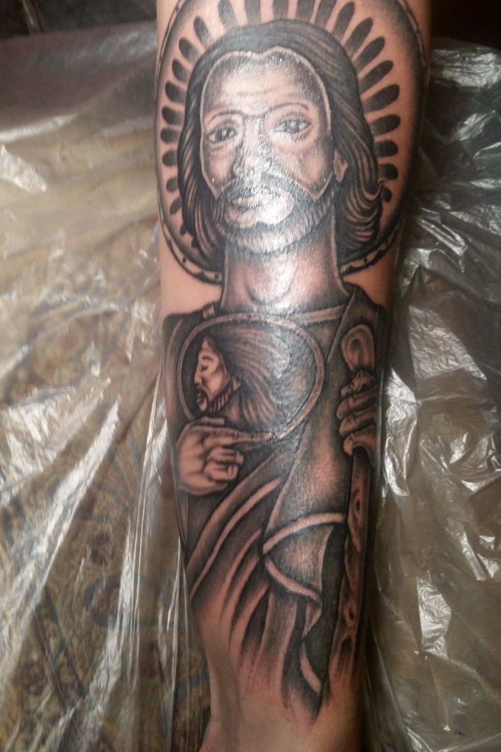 Saint Jude tattoo located on the forearm