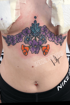 Floral underboob tattoo by @inkedupshi on instagram 