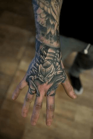 Scorpian hand tattoo