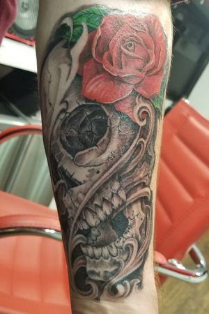 I got this piece done in March of 2018. It's a human skull with a rose. The skull is a representation of myself. The rose represents my wife. I look at this as the skull being the dark side of myself filled with rage and inner demons. The rose represents the light in my darkness, my better half, the better days. AKA, My wife. I got this done by Joey, owner of Body Art Bus in Temecula, CA. 