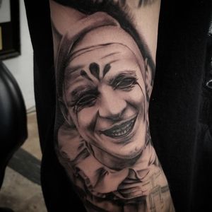 Crazy clown on the arm