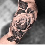 Rose tattoo inner arm bicep done by Joey Boon