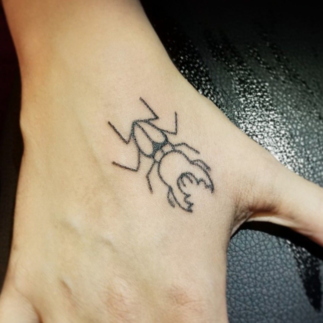 50 Minimalist Hand Poke Tattoo Designs by Pokeeeeeeeoh  TattooAdore  Beetle  tattoo Insect tattoo Scarab tattoo