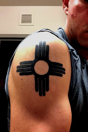Its a zia symbol from the state flag where i was born and raised! New Mexico!