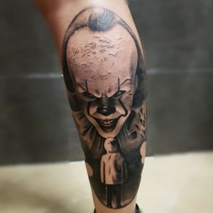 "We all float down here!"Realistic black and grey penny wise tattoo!