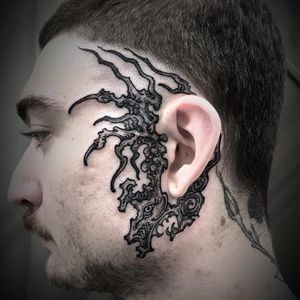 Tattoo by Ganji #Ganji #headtattoo #scalptattoo #scalp #head #face #fire #surreal #strange #creature #yokai #eye #monster