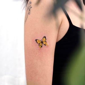 Tattoo by Siyeon #Siyeon #butterflytattoo #butterfly #insect #nature #wings #fly #pattern #watercolor #realistic #realism #color #tiny #small #minimal #cute #yellow