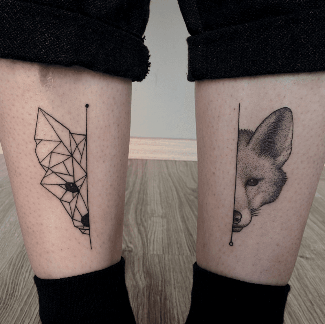 Watercolor style fox tattoo on the left forearm