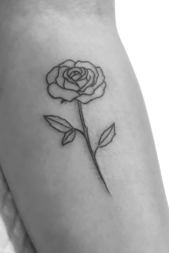 black rose, forearm tattoo, simple tattoo, white shirt, black jeans, black  sneakers